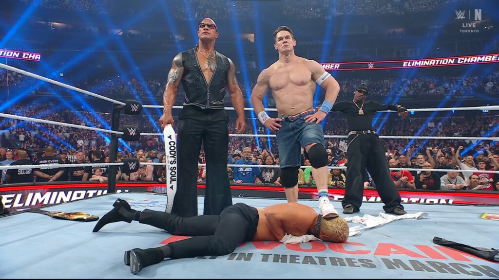 ohn Cena delivers a surprise attack on Cody Rhodes, turning heel in a dramatic wrestling moment.