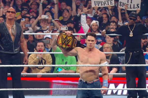 John Cena and Travis Scott and The Rock during heel turn at WWE Elimination Chamber 2025
